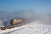 1116 153  ÖAMTC  fährt bei sich langsam auflösendem Nebel mit einem RJ bei Grabenstätt in Richtung Innsbruck, aufgenommen am 28. Januar 2017.