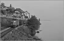 Die SBB Ae 6/6 11485 Thun  mit einem Güterzug auf dem Weg Richtung Lausanne bei St-Saphorin.
25. Okt. 2012