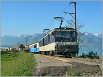 Eine MOB GDe 4/4 Serie 6000 mit dem GoldenPass Classic N° 2216 von Montreux nach Zweisimmen in Châtelard (VD).
22. April 2007