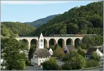 Das klassische Motiv der  Alten Hauensteinstrecke : Rümligen und sein Viadukt dienten als Kulisse für die 52 8055 mit ihre (Plan)-Dampfzug auf dem Weg nach Sissach. 
2. Okt. 2009