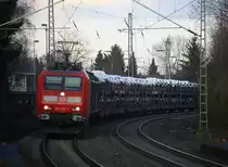185 043-7 DB  kommt mit einem Audi-VW-Skoda-Zug aus Osnabrück nach Kortenberg-Goederen(B) und kommt aus Richtung Mönchengladbach-Hbf,Rheydt-Hbf,Wickrath,Beckrath,Herrath und fährt durch Erkelenz in Richtung Baal,Hückelhoven-Baal,Brachelen,Lindern,Süggerrath,Geilenkirchen,Frelenberg,Zweibrüggen,Übach-Palenberg,Rimburg,Finkenrath,Hofstadt,Herzogenrath, Kohlscheid,Richterich,Laurensberg,Aachen-West. 
Aufgenommen vom Bahnsteig 1 in Erkelenz. 
Bei Sonnenschein und Wolken am Nachmittag vom 24.2.2017.