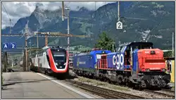 IC3 571 mit einem RABDe502, Widmer Rail Services 193 493-4 und Am 843 062-1 in Landquart.