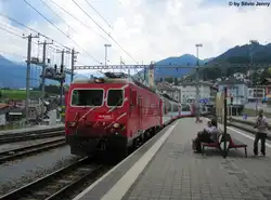 HGe 4/4'' 101 ''Ville de Sion/Sitten'' am 4.8.2012 in Disentis/Must�r mit dem GEX 908.