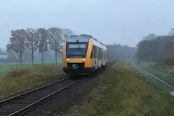 Lint-Triebwagen von Syntus mit Regionalzug 31248 Oldenzaal-Zutphen bei Almen am 19-11-2012.