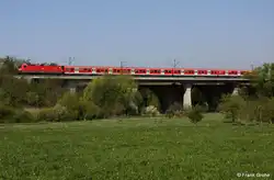 DB 143 624-5 schiebt S 39615 Roth - Altdorf, S-Bahn N�rnberg, KBS 890.2 Roth - Altdorf, fotografiert auf der Rednitzbr�cke bei Wolkersdorf am 20.04.2011 --> Leider wird an dieser Stelle die sch�ne