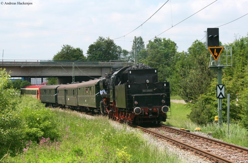 VT 121 der HzL und 50 2988 als HzL 648 (Trossingen Stadt-Trossingen DB) am km 1,0 1.6.09