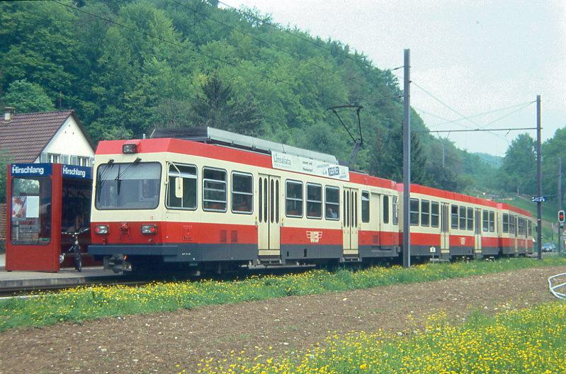 WB Regionalzug 41 von Waldenburg nach Liestal am 08.05.1993 in Hirschlang mit Steuerwagen voraus Bt 120 - Bt 118 - Triebwagen BDe 4/4 13. Hinweis: Rckansicht
