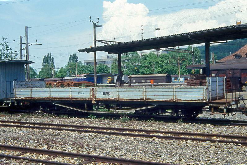 WB - Rkm 312 am 09.05.1993 in Liestal - Niederbordwagen - SIG - Baujahr 1900 - Gewicht 6,78t - Zuladung 6,50t - LP 10,80m - zulssige Geschwindigkeit km/h 55 - =27.02.1979. Hinweis: Anschrift R 312
