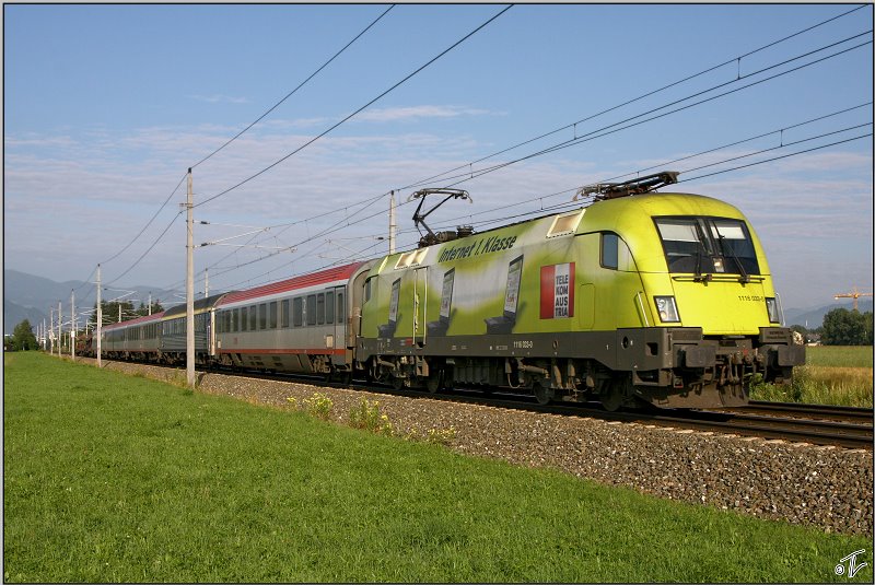 Werbetaurus 1116 033 Telekom Austria fhrt mit EN 465  Zrichsee  von Zrich nach Graz.Aufgund der Ennstalsperre fhrt dieser Zug als 30465 ber Villach.
Zeltweg 06.07.2009
