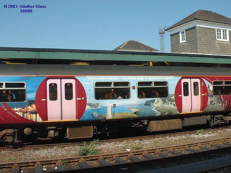 Werbung fr Sd-West-England am anderen Wagen des Triebzuges 150 247 Wessex Trains am 17.09.2003 in Plymouth.