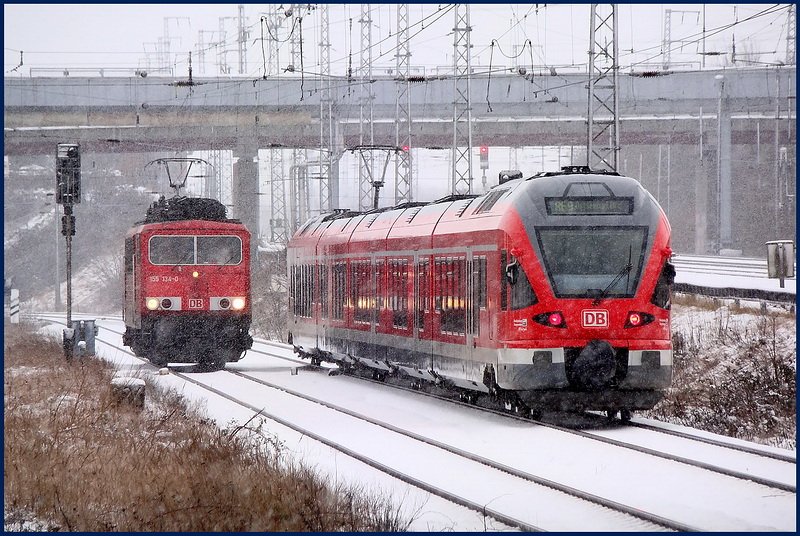 Winter in Stralsund. Am 11.02.09 wartet 155 134-0 auf  Freie Fahrt  in den Hbf.
