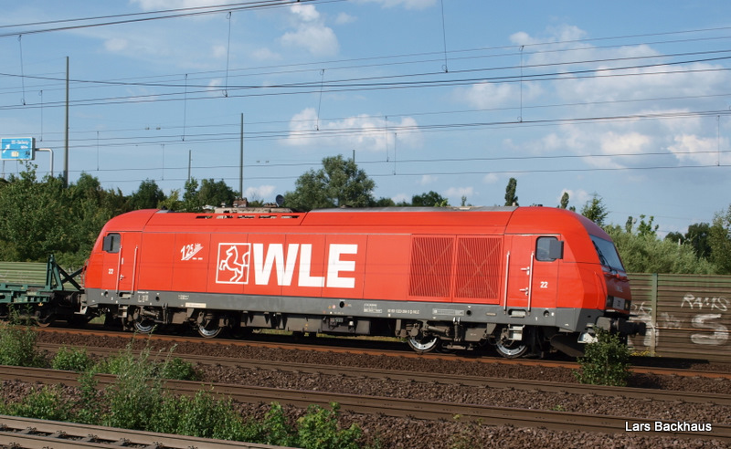 WLE 22 zieht einen Schienenleerzug auf den Ostgleisen durch Hamburg-Harburg Richtung Sden. 