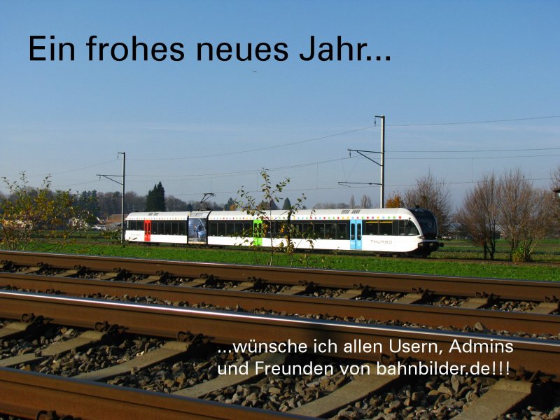 ...zum Bild: Am 15. November 2008 f�hrt ein RABe 526 auf der Seelinie in Richtung Kreuzlingen. Im Vordergrund sind die Gleise der Strecke nach Weinfelden sichtbar.
Euch allen einen guten Rutsch und ein tolles Jahr 2009!!!