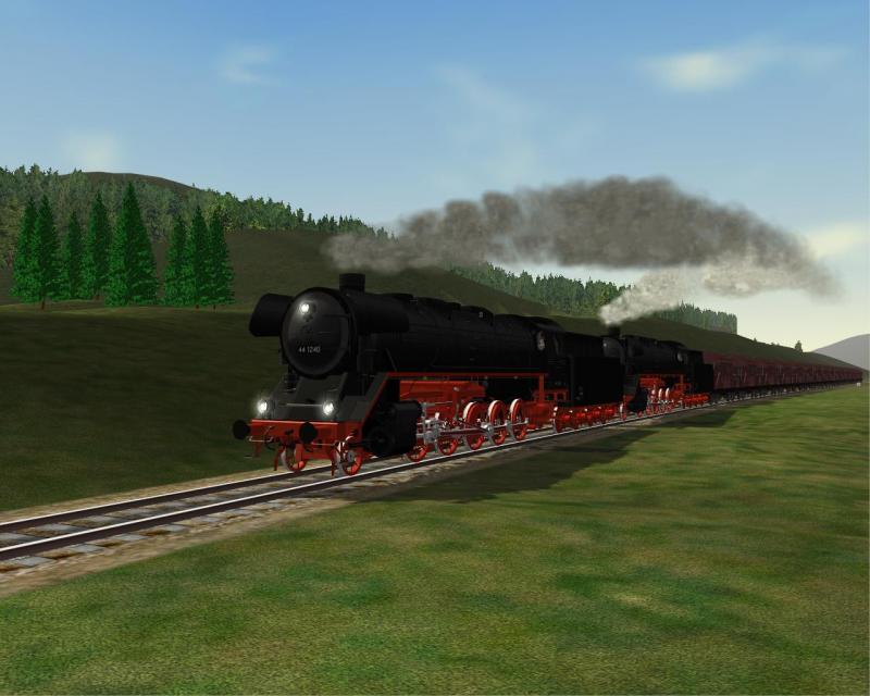 Zwei DR  Jumbos  kmpfen sich mit einem 1200t Zug durch das Werratal, hier kurz hinter Meiningen.