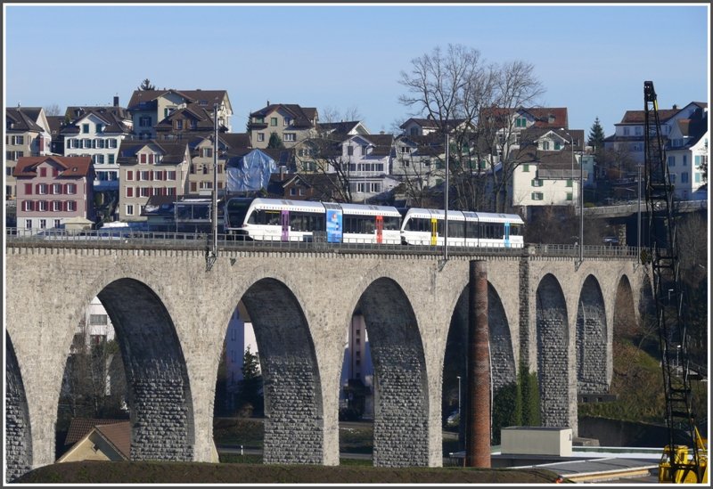 Zwei RABe 526 Thurbo kurz vor dem Bahnhof Herisau im Kanton Appenzell Ausserrhoden auf den Geleisen der Sdostbahn. (08.12.2008)