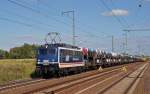 110 043 beförderte am 09.07.15 einen VW-Zug vom Werk Zwickau kommend durch Rodleben Richtung Magdeburg.
