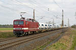 Mit einem Crafter-Zug am Haken rollt 243 864 von Delta Rail am 03.03.24 durch Wittenberg-Labetz Richtung Dessau.